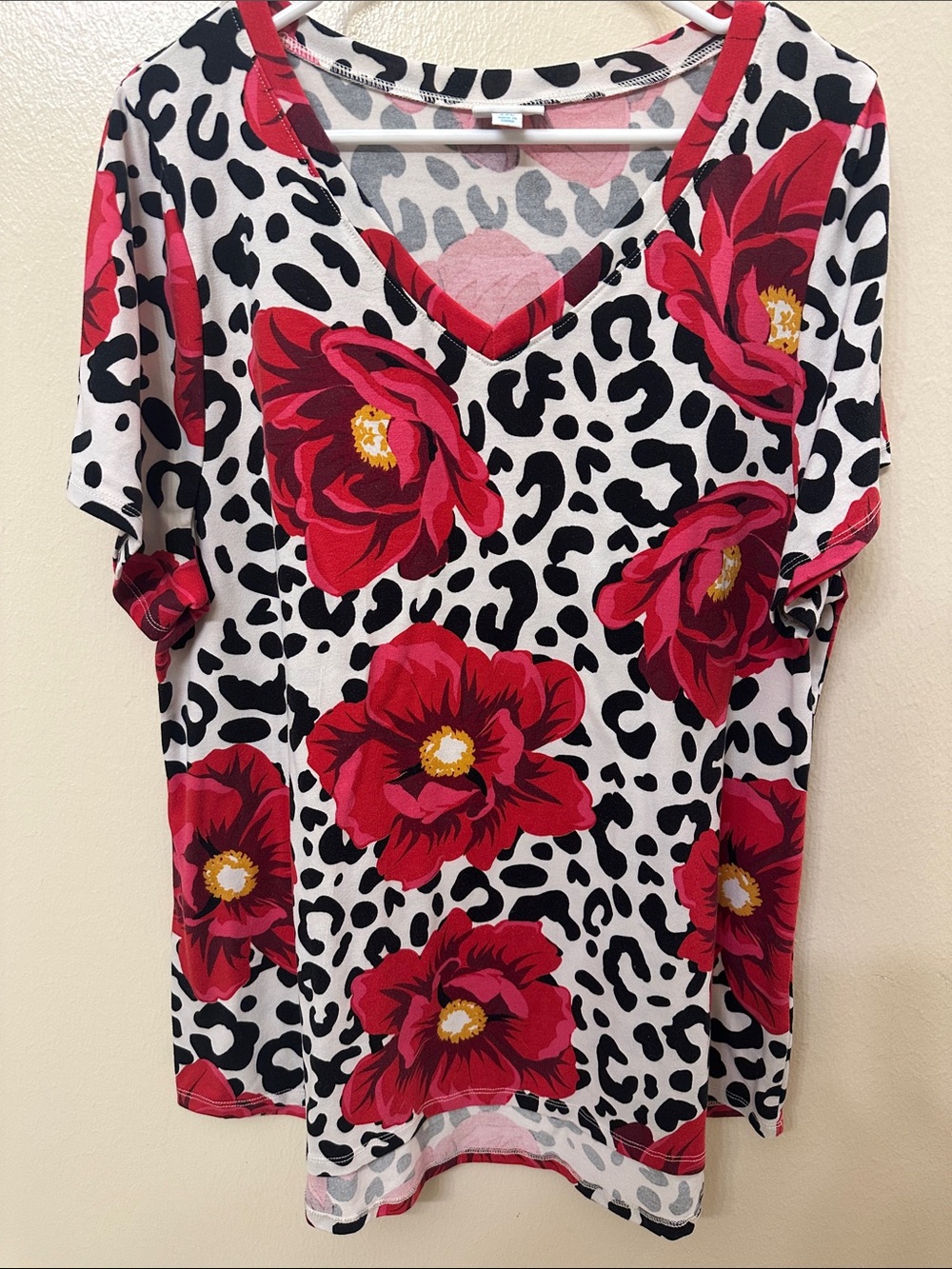 LuLaRoe Black-and-White Leopard Tee with Red Floral Print